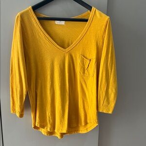 T.la, yellow 3/4 sleeve t-shirt.